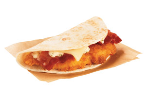 A Dunkin’ Donuts crispy Chicken & Bacon Snack N’ Go Wrap on a napkin